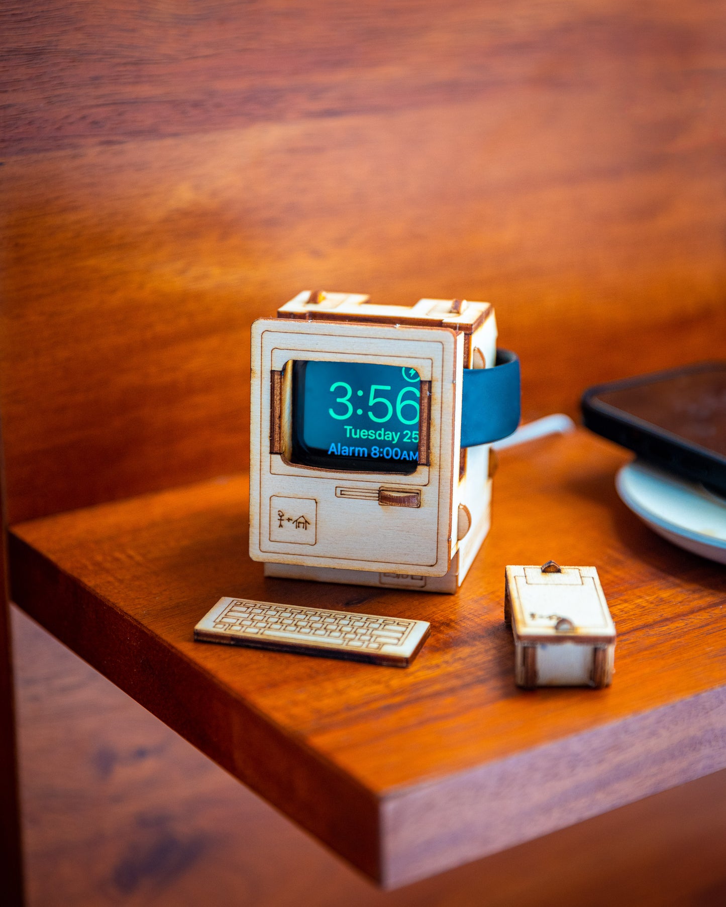 wooden Apple Watch dock inspired by classic vintage computer design displayed on nightstand