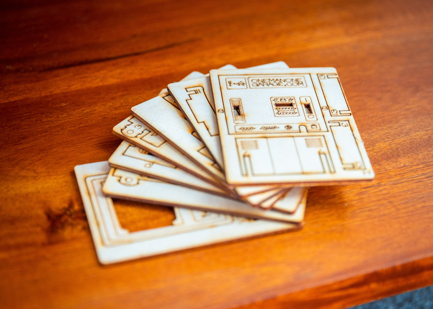 laser-cut wooden pieces for retro computer Apple Watch stand before assembly