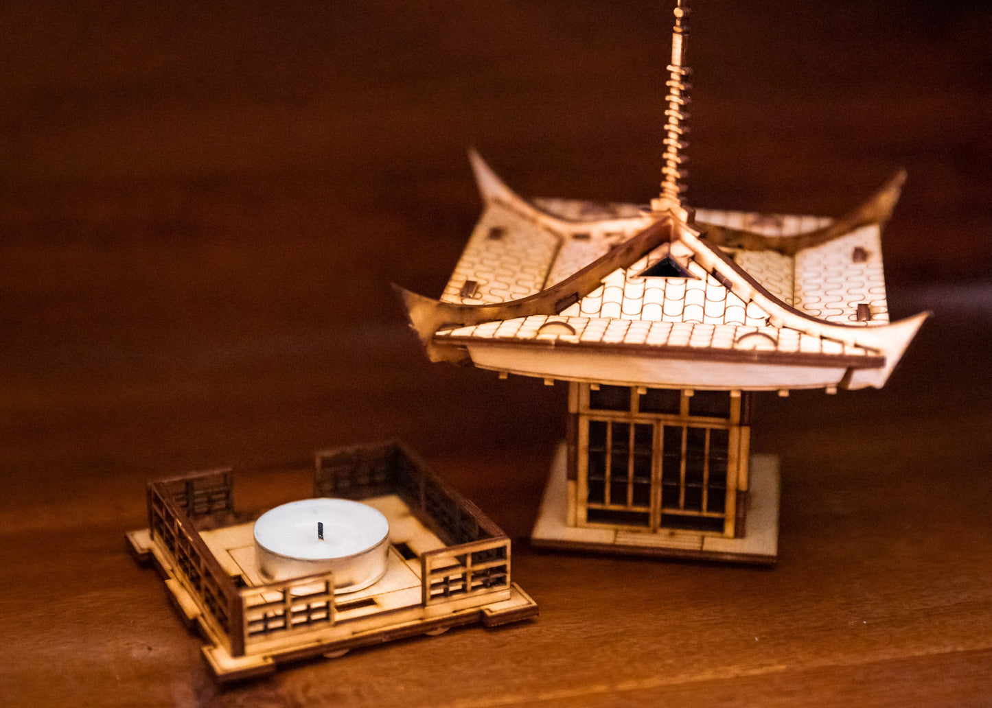 Pagoda candle holder with removable base showing LED tea light candle placement after assembly