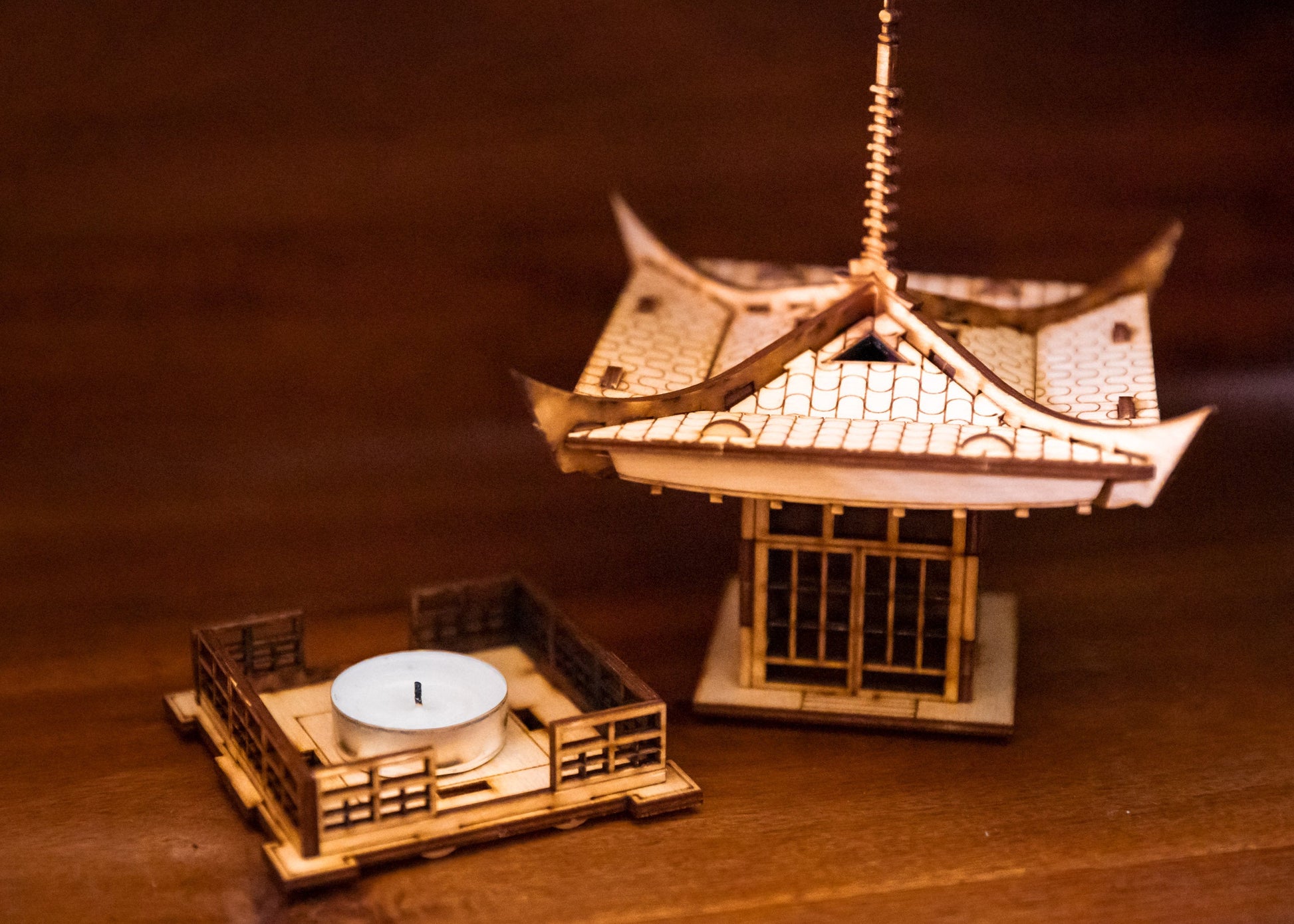 Pagoda candle holder with removable base showing LED tea light candle placement after assembly