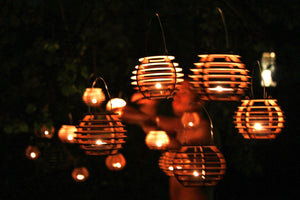 Firefly Luminairies. Wooden lantern kits for tealights. Light up your outdoor party!