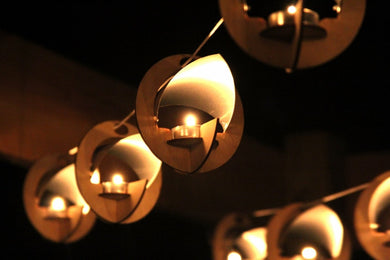 Skyboats: Hanging Lantern String Lights.  Tealight Candle Lit kits with tin reflectors