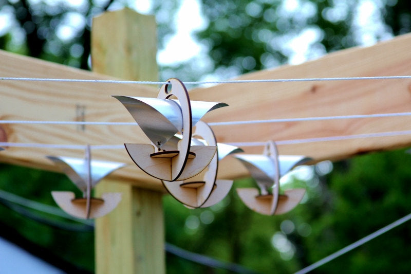 Skyboats: Hanging Lantern String Lights.  Tealight Candle Lit kits with tin reflectors
