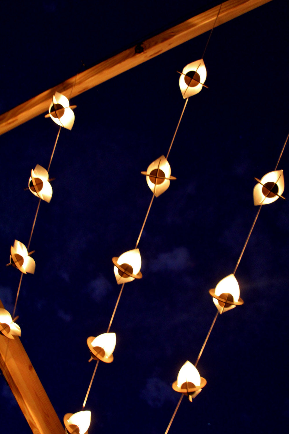 Skyboats: Hanging Lantern String Lights.  Tealight Candle Lit kits with tin reflectors