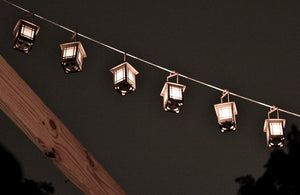 Craftsman Bungalow Luminaires. Lanterns give off warm light while hanging or on a table.