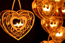 Load image into Gallery viewer, Heartstrings, Hanging Tealight Luminaire kits. Natural wood model kit you snap together!