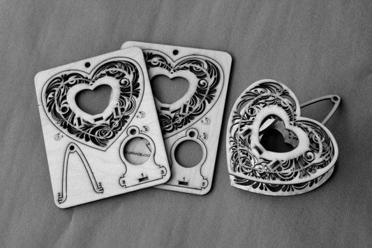 Heartstrings, Hanging Tealight Luminaire kits. Natural wood model kit you snap together!